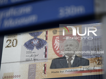 Illustration of a bank note with a portrait of the late former president of Poland Lech Kaczynski is seen on the exterior of the Bank Narodo...