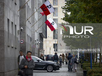 Flags are seen on the exterior of the National Bank of Poland building in Warsaw, Poland on 27 September, 2022. (