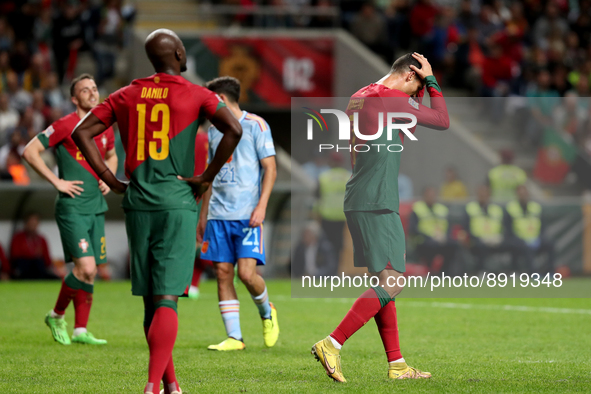 Cristiano Ronaldo of Portugal (R ) reacts during the UEFA Nations League Group A2 football match between Portugal and Spain, at the Municipa...