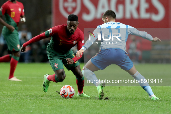 Nuno Mendes of Portugal (L) vies with Ferran Torres of Spain during the UEFA Nations League Group A2 football match between Portugal and Spa...