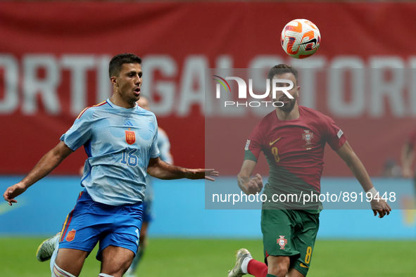 Bruno Fernandes of Portugal (R ) vies with Rodri of Spain during the UEFA Nations League Group A2 football match between Portugal and Spain,...