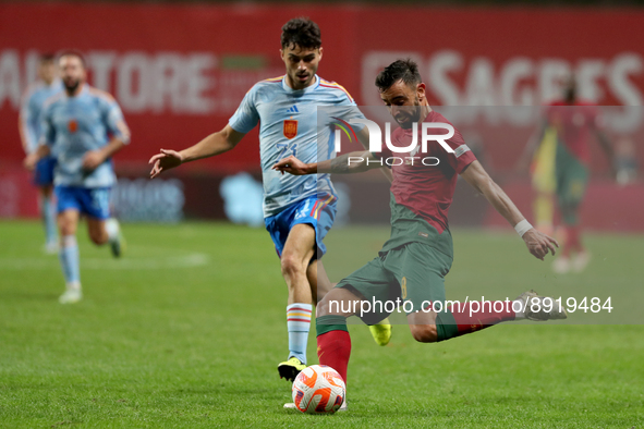 Bruno Fernandes of Portugal (R ) vies with Pedri of Spain during the UEFA Nations League Group A2 football match between Portugal and Spain,...