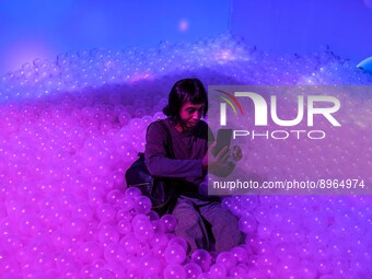 Visitors visit Vivo art exhibition at Lotte Shopping Avenue mall in Jakarta, Indonesia, October 7, 2022. The purpose of the art exhibition i...