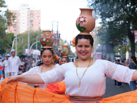 Cavalcade of the festival of Hispanic heritage, in which groups from Bolivia, Chile, Colombia, Paraguay and Mexico parade, and in Madrid. 08...