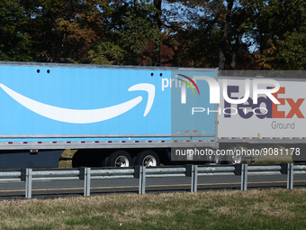 Prime and FedEx logos are seen on a truck semitrailers on the highway in Delaware, United States on October 21, 2022. (