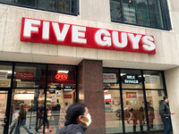 Five Guys logo is seen on the restaurant in Chicago, United States on October 14, 2022. (
