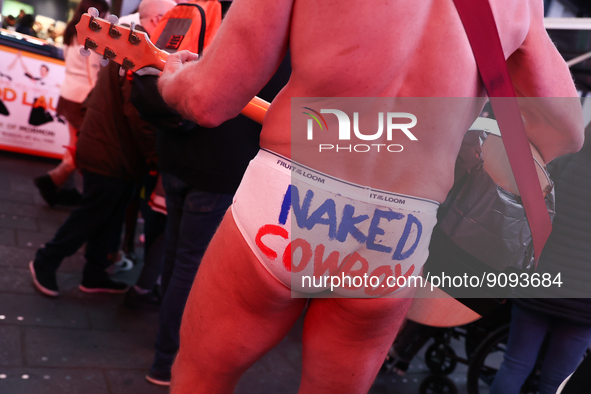 Robert John Burck, the Naked Cowboy, performs on Times Square in New York City, United States on October 22, 2022. 