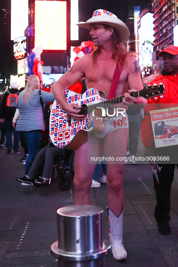 Robert John Burck, the Naked Cowboy, performs on Times Square in New York City, United States on October 22, 2022. 