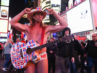 Robert John Burck, the Naked Cowboy, poses for a photo on Times Square in New York City, United States on October 22, 2022. (
