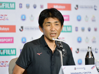 Assistant head coach Masaru Okita of Hokkaido Consadole Sapporo speaks to media during the pre-match press conference of J.League Asia Chall...
