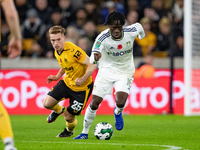 Leeds United's Darko Gyabi and Wolvess Connor Ronan during the Carabao Cup match between Wolverhampton Wanderers and Leeds United at Molineu...