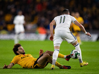 Wolves's Rayan At-Nouri and Leeds United's Jack Harrison during the Carabao Cup match between Wolverhampton Wanderers and Leeds United at Mo...