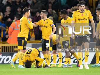 Boubacar Traore of Wolves (on the floor) celebrates scoring their side's first goal of the game during the Carabao Cup match between Wolverh...