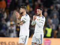 Leeds United's Mateusz Klich and Leeds United's Sam Greenwood applauds the fans after  the Carabao Cup match between Wolverhampton Wanderers...