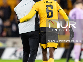 Wolvess manager Steve Davis and Boubacar Traore of Wolves after  the Carabao Cup match between Wolverhampton Wanderers and Leeds United at M...