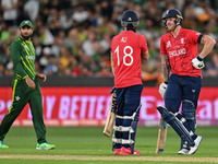 Moeen Ali and ben Stokes of England during the ICC Men's T20 World Cup match between Pakistan and England at Melbourne Cricket Ground on Nov...