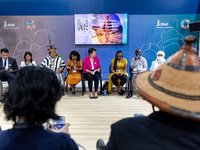 Participants meet on a discussion panel on the fifth day of the COP27 UN Climate Change Conference, held by UNFCCC in Sharm El-Sheikh Intern...