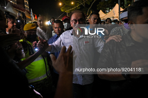 Malaysian opposition leader Anwar Ibrahim greeted by the people during an election campaign ahead of Malaysias 15th general election in Kual...