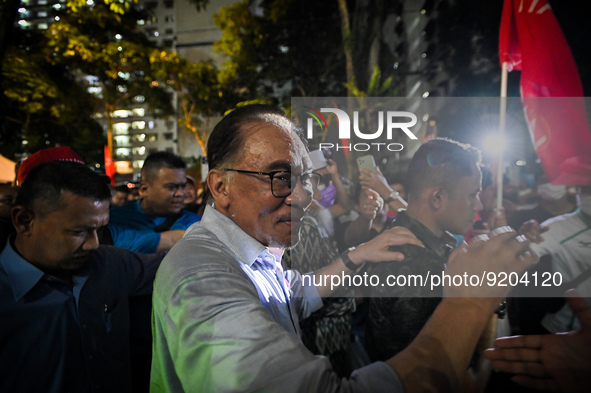 Malaysian opposition leader Anwar Ibrahim greeted by the people during an election campaign ahead of Malaysias 15th general election in Kual...