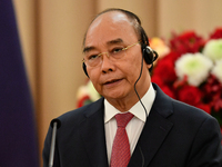 Vietnamese President Nguyen Xuan Phuc speaks in press conference during the official visit Thailand at the Thai Government House in Bangkok...