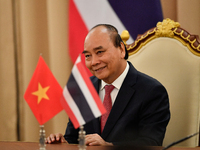 Vietnamese President Nguyen Xuan Phuc reacts in press conference during the official visit Thailand at the Thai Government House in Bangkok...