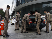Thai police officers inspect a vehicle in front of the Queen Sirikit National Convention Center upcoming Asia-Pacific Economic Cooperation (...