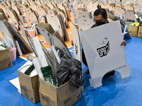 Election commission worker make final checks on ballot boxes and voting equipments ahead of general election in Shah Alam, Malaysia on Novem...