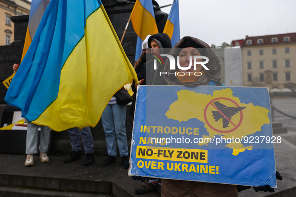 Ukrainian citizens and Polish supporters attend an everyday demonstration of solidarity with Ukraine at the Main Square, on the 273rd day of...