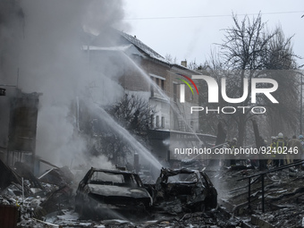 Rescuers work at a site of a residential building destroyed by a Russian missile attack in the  Vyshhorod town, near Kyiv, Ukraine, November...