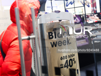 Black week sign is seen in a store in Krakow, Poland on November 24, 2022. (