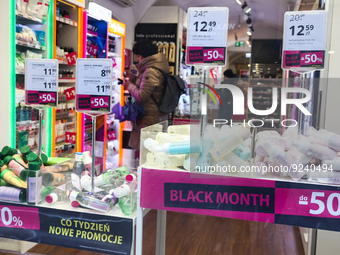 Black month sign is seen in a store window in Krakow, Poland on November 24, 2022. (