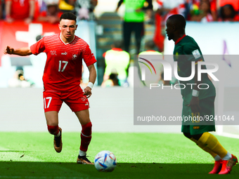 Ruben Vargas (SUI), Simon Ngapandouetnbu (CMR) during the World Cup match between Switzerland vs Cameroon , in Doha, Qatar, on November 24,...