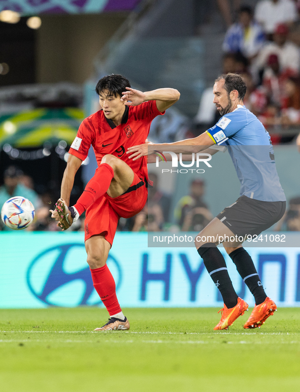 Luis Suarez , Jinsu Kim  during the World Cup match between Uruguay v Korea Republic in Doha, Qatar, on November 24, 2022. 