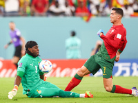 Lawrence Ati Zigi (GHA), Cristiano Ronaldo (POR) during the World Cup match between Portugal v Ghana  , in Doha, Qatar, on November 24, 2022...