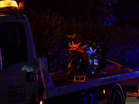 The motorbike on the tow truck after the fatal collision on the Terminillese road in Rieti, 24 November 2022.  (