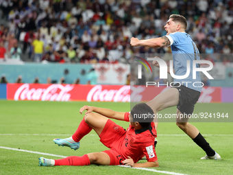 Lee Kang-In of South Korea, Federico Valverde of Uruguay during the FIFA World Cup 2022, Group H football match between Uruguay and Korea Re...