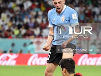 Federico Valverde of Uruguay, Lee Kang-In of South Korea during the FIFA World Cup 2022, Group H football match between Uruguay and Korea Re...