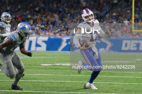 Buffalo Bills quarterback Josh Allen (17) runs the ball during the first half of an NFL football game between the Detroit Lions and the Buff...
