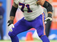 Buffalo Bills offensive tackle Ryan Bates (71) prepares to start a play at the line of scrimmage during an NFL football game between the Det...