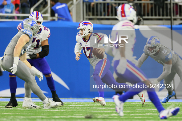Buffalo Bills quarterback Josh Allen (17) runs the ball during an NFL football game between the Detroit Lions and the Buffalo Bills in Detro...