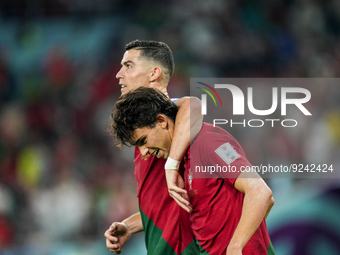 (11) JOAO FELIX of Portugal team celebrate with his teammate (7) CRISTIANO RONALDO after score second goal during FIFA World Cup Qatar 2022...