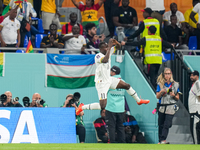 (11) of Ghana team celebrate on way CRISTIANO RONALDO after score second goal during FIFA World Cup Qatar 2022  Group H football match betwe...