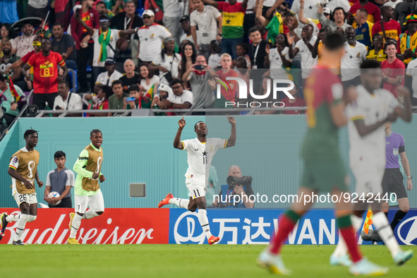 (11) of Ghana team celebrate after score second goal during FIFA World Cup Qatar 2022  Group H football match between Portugal and Ghana at...