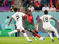 (15) RAFAEL LEAO of Portugal team battel for possession with (18) AMARTEY Daniel and (2) LAMPTEY Tariq of Ghana team during FIFA World Cup Q...
