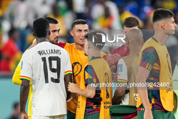 (7) CRISTIANO RONALDO of Portugal team with teammate after won the match at FIFA World Cup Qatar 2022  Group H football match between Portug...