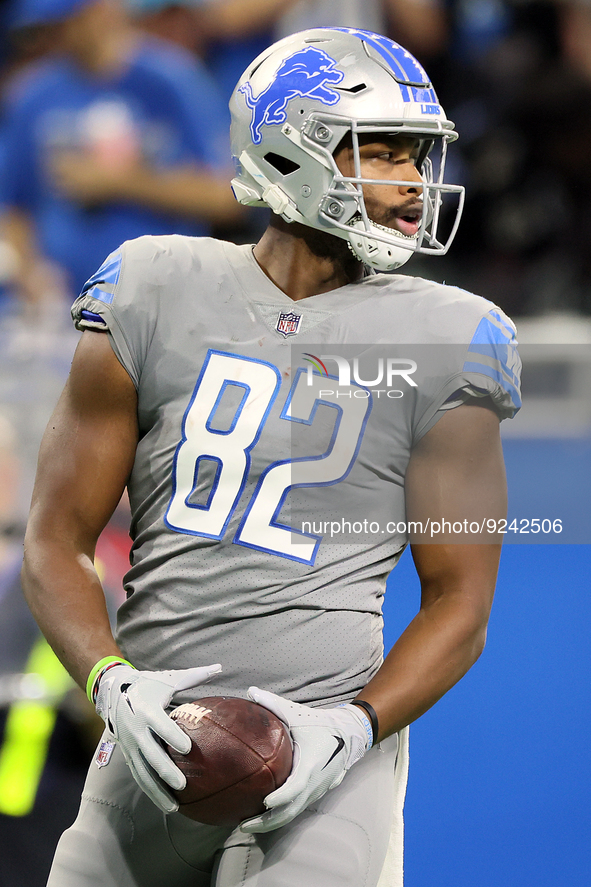 Detroit Lions tight end James Mitchell (82) holds onto the ball during an NFL football game between the Detroit Lions and the Buffalo Bills...