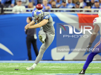 Detroit Lions punter Jack Fox (3) kicks during an NFL football game between the Detroit Lions and the Buffalo Bills in Detroit, Michigan USA...