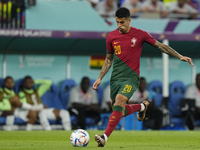 Raphael Guerreiro Left-Back of Portugal and Borussia Dortmund controls the ball during the FIFA World Cup Qatar 2022 Group H match between P...