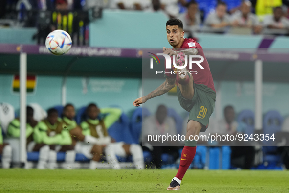 Joao Cancelo Left-Back of Portugal and Manchester City does passed during the FIFA World Cup Qatar 2022 Group H match between Portugal and G...