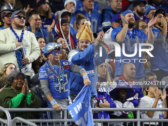 Detroit Lions fans cheer during during the second half of an NFL football game between the Detroit Lions and the Buffalo Bills in Detroit, M...